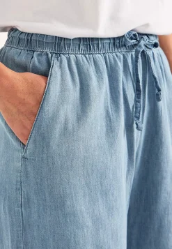 Online Byxa i denim med vida ben Byxor|Jeansplagg