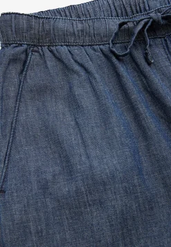 Sale Byxa i denim med vida ben Byxor|Jeansplagg